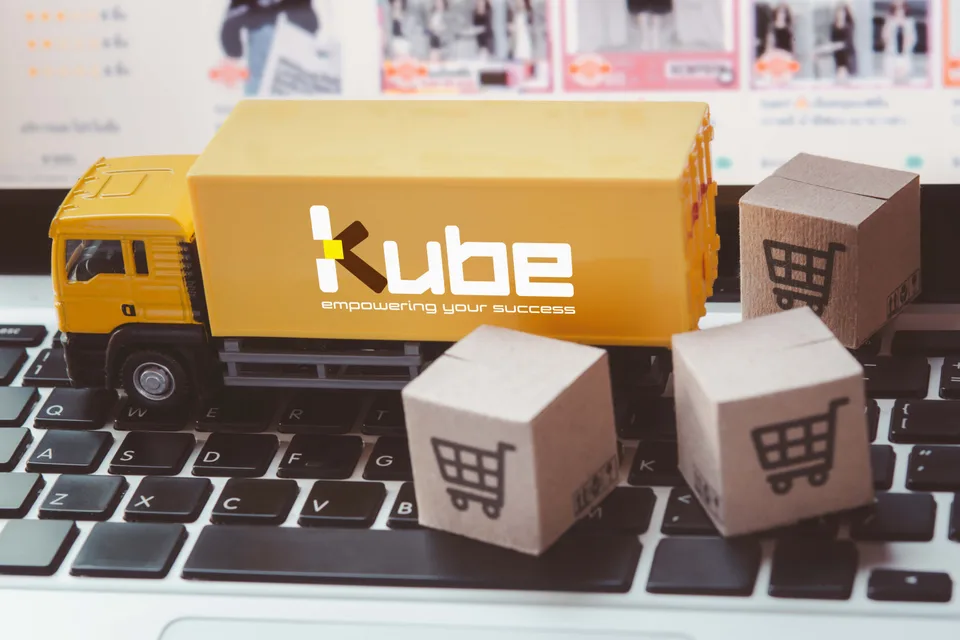 A Kube-branded delivery truck model with parcels